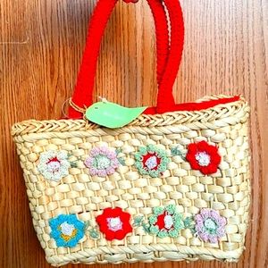 Straw mini bag with a zipper, red interior